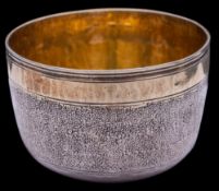 A late 17th Century silver and parcel gilt tumbler cup, maker T.