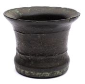 A late 16th/early 17th Century bronze mortar: cast with two founders/foundry marks, 12cm high,