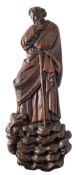 A late 17th/early 18th Century carved limewood low relief figure: of St Michael dressed in robes