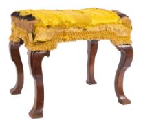 An early 18th Century walnut stool:, with a rectangular stuff over seat,