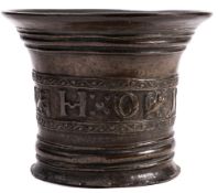 An early 18th Century mortar: cast H O 1707 and banded decoration of birds and animal,