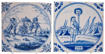 Two Dutch blue and white delft 'biblical' tiles: comprising the Spies of Cannan in a circular panel