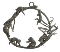 A 19th Century Chinese cast bronze bamboo hoop: decorated with frolicking monkeys, unsigned, 24cm.