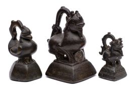 A group of three Burmese bronze 'duck' opium weights: of graduated size and traditional form,