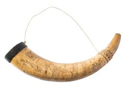 An early 19th Century scrimshaw powder horn: the ox horn engraved with birds, a kangaroo,