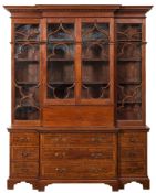 An unusual mid 18th Century mahogany breakfront secretaire library bookcase:,