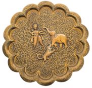 An Indian brass charger: of lobed circular form with embossed decoration of the Liberation of