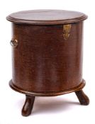 An early 18th Century oak circular drum-shaped commode:,