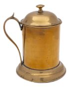 A George III period brass lidded tankard: of plain cylindrical outline with domed lift-off lid and