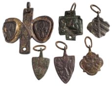Six late Medieval horse harness pendants: includes two shield-shaped,