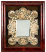 A rare dated Charles II stumpwork mirror: the rectangular bevelled plate enclosed in a shaped frame
