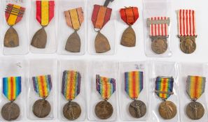 A group of French, Belgian and Allied WWI medals:, including two French Victory Medals,
