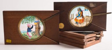 Four lithograph magic lantern glass slipping slides:, together with two brass lever slides,