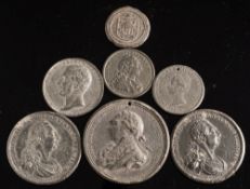 Eight various white metal medallions:.