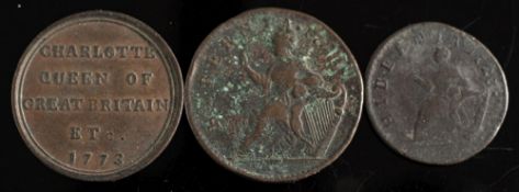 An Irish Woods halfpenny and farthing together with a Queen Charlotte token:.