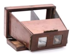 A mahogany folding stereoscope viewer by Brevete SGDG:, signed as per title, with brass hinges,