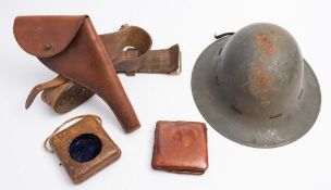 A WWII Brodie pattern steel helmet: with leather lining stamped 'CCL 1941' size 7 3/4,