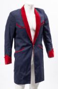 A 1950'S/60'S Teddy Boy jacket by 'Jackson the Tailor': with navy blue with a red velvet collar and