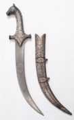 A North Indian khanjar:, the curved damascus blade inlaid to one side with white metal cartouche,