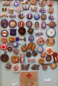 A collection of World War One patriotic lapel badges: includes 'Speed Up Munitions',