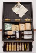 An early 20th century leather cased apothecary's set by Army & Navy, London:,