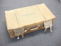 A late 19th/early 20th century large brown leather travelling trunk: with drop in tray,