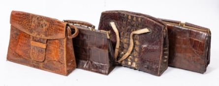 A group of four mid-20th century crocodile skin handbags:, unsigned.