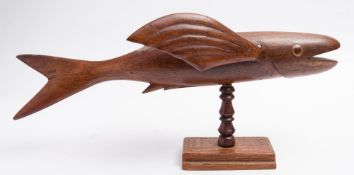 A Pitcairn carved wooden model of a flying fish ' unsigned:, open mouth and inlaid eyes,