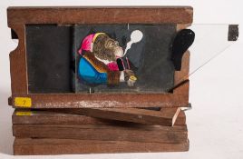 A 19th century hand painted magic lantern double slipping slide of an anthropomorphic monkey