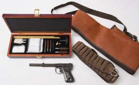 A Milbro Model 2 Gat style air pistol:, together with a cased gun cleaning kit,