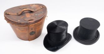 A black felt top hat by Alfred Pellett Ltd, Manchester:, 54cm, in size,