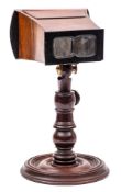 A Victorian rosewood and mahogany Brewster pattern table top stereoscopic viewer:,