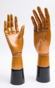 A pair of treen artist's mannequin articulated hands:, unsigned,