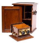 A walnut and brass Acromatic table top Stereoscope by Smith, Beck & Beck, London:,