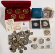 An 1884(o) silver Morgan dollar with other silver coins and mixed world.
