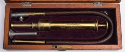 A Victorian surgeon's cased enema set by Botschan, London:, the brass tube signed as per title,