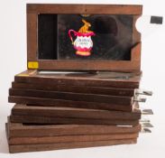 A group of ten hand painted magic lantern glass slipping slides:, including 'Jugged hare' ,