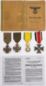 Two Croix de Guerre, a Medaille Militaire and an Iron Cross:.