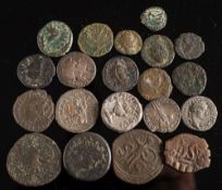 A collection of various Roman coins:.