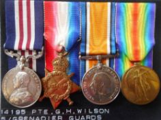 A World War One Military Medal group of four to 14195 Pte. G. H. Wilson. 5/G.Gds.