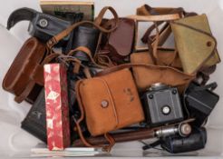 A collection of various cameras and accessories: including a 'Rapid' small camera,