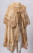A cream damask and lacework christening gown:, a child's whitework christening gown and two bodices,