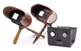 Two Holmes pattern stereoscope viewers: and a tinplate folding viewer,