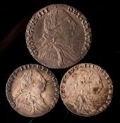 A 1787 shilling and two 1787 sixpences.