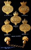 Grenadier Guards: collection of five cast brass pouch badges includes William IV, Victoria,