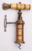 A brass barrelled narrow rack Kings corkscrew:, with bone handle and brush,