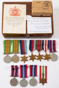 A collection of ten WWII service medals, together with a postage box for Mr P D Hinder:.