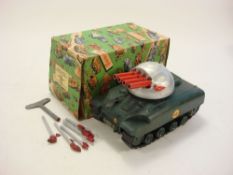 Tri-ang M117 Rocket-Firing tank:, red cannons on a silver turret,