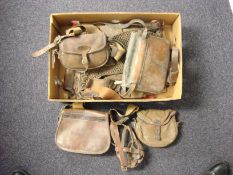 A small collection of brown leather and canvas game and cartridge bags:,