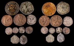 A selection including Derbyshire Miners Association tag, a 1734 halfpenny, lead seal,
